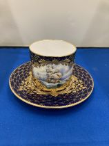 A LYNTON PORCELAIN HAND PAINTED COFFEE CAN AND SAUCER, BRITISH MAN OF WARSHIPS ON THE HIGH SEAS,