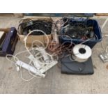 AN ASSORTMENT OF CABLES, EXTENSION LEADS AND A VHS PLAYER ETC