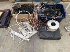 AN ASSORTMENT OF CABLES, EXTENSION LEADS AND A VHS PLAYER ETC