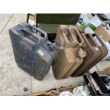 THREE VINTAGE METAL JERRY CANS