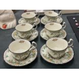 A VINTAGE SET OF SIX ROYAL DOULTON CUPS AND SAUCERS, REG NO. 702852