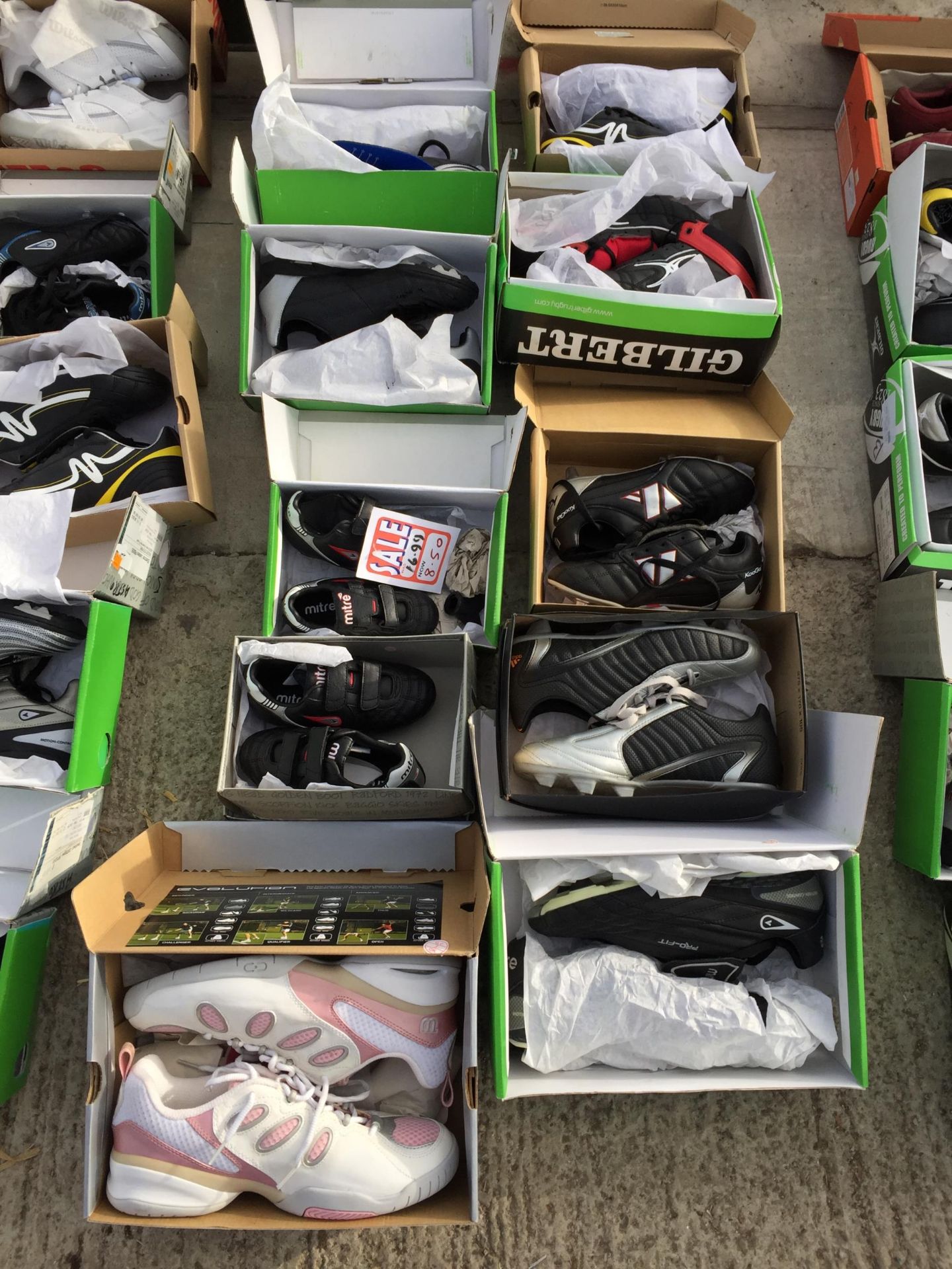 TEN PAIRS OF AS NEW AND BOXED SPORTS BOOTS AND TRAINERS