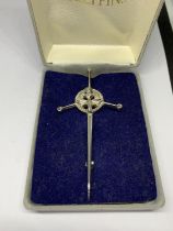 A SWORD AND THISTLE DESIGN KILT PIN IN A PRESENTATION BOX