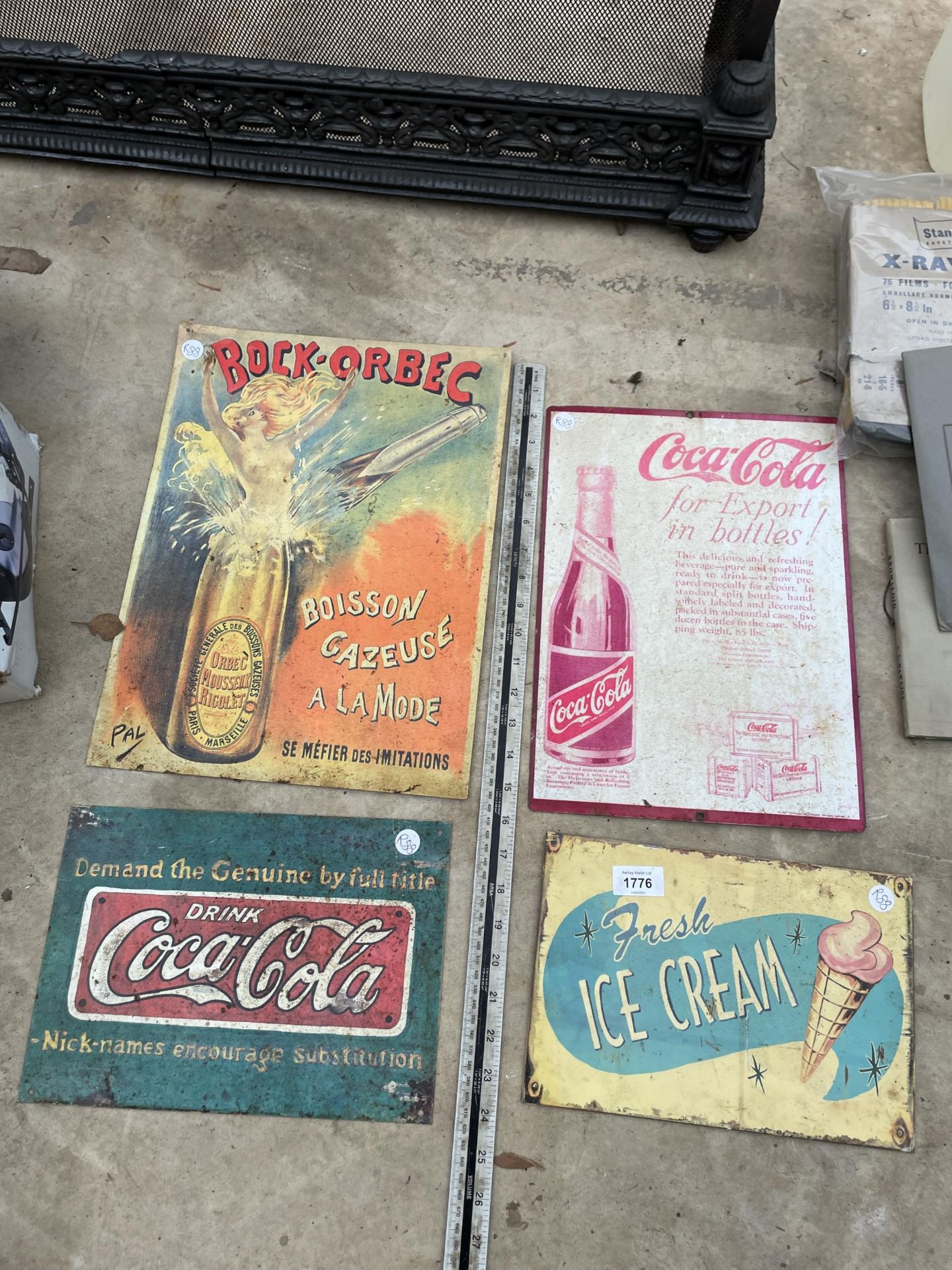 AN ASSORTMENT OF TIN SIGNS TO INCLUDE COCA-COLA ETC