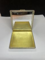 A HALLMARKED LONDON SILVER COMPACT WITH MIRROR