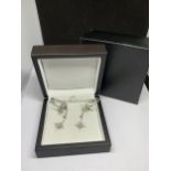 A PAIR OF 18 CARAT WHITE GOLD 4 IN 1 EARRINGS BY BOODLES. BRILLIANT CUT DIAMOND SET. CAN BE