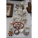 A LARGE COLLECTION OF MINIATURE CHINA AND POTTERY TO INCLUDE LIMOGES AND HAMMERSLEY TEASETS ON