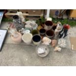 A LARGE ASSORTMENT OF CERAMICS TO INCLUDE VASES AND POTS ETC
