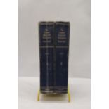 A PAIR OF OXFORD UNIVERSAL DICTIONARY'S IN METAL STAND