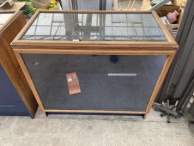 A VINTAGE GLASS FRONTED SHOP DISPLAY UNIT