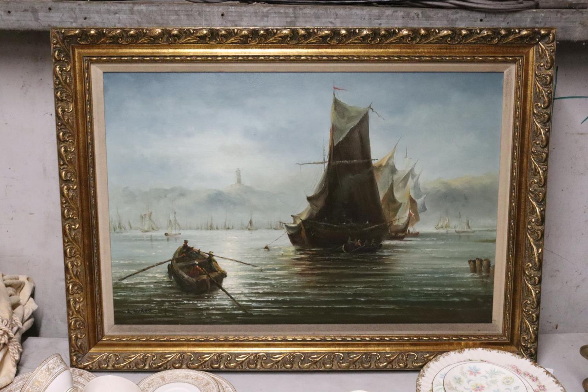 A LARGE OIL ON BOARD OF A MARITIME SCENE, IN A GILT FRAME, SIGNED R VOLKOV, 90CM X 65CM