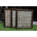 THREE FRAMED COLLECTIONS OF TRAINS, CARS AND NAVAL UNIFORMS