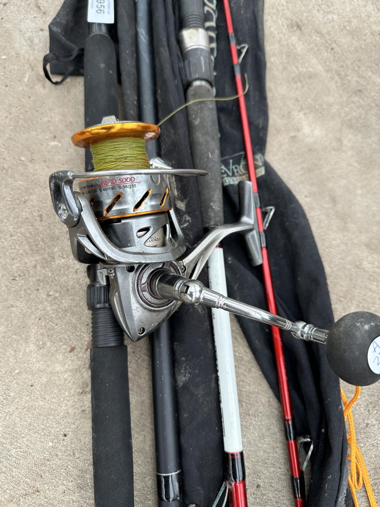 AN ASSORTMENT OF FISHING RODS AND A REEL - Image 2 of 3