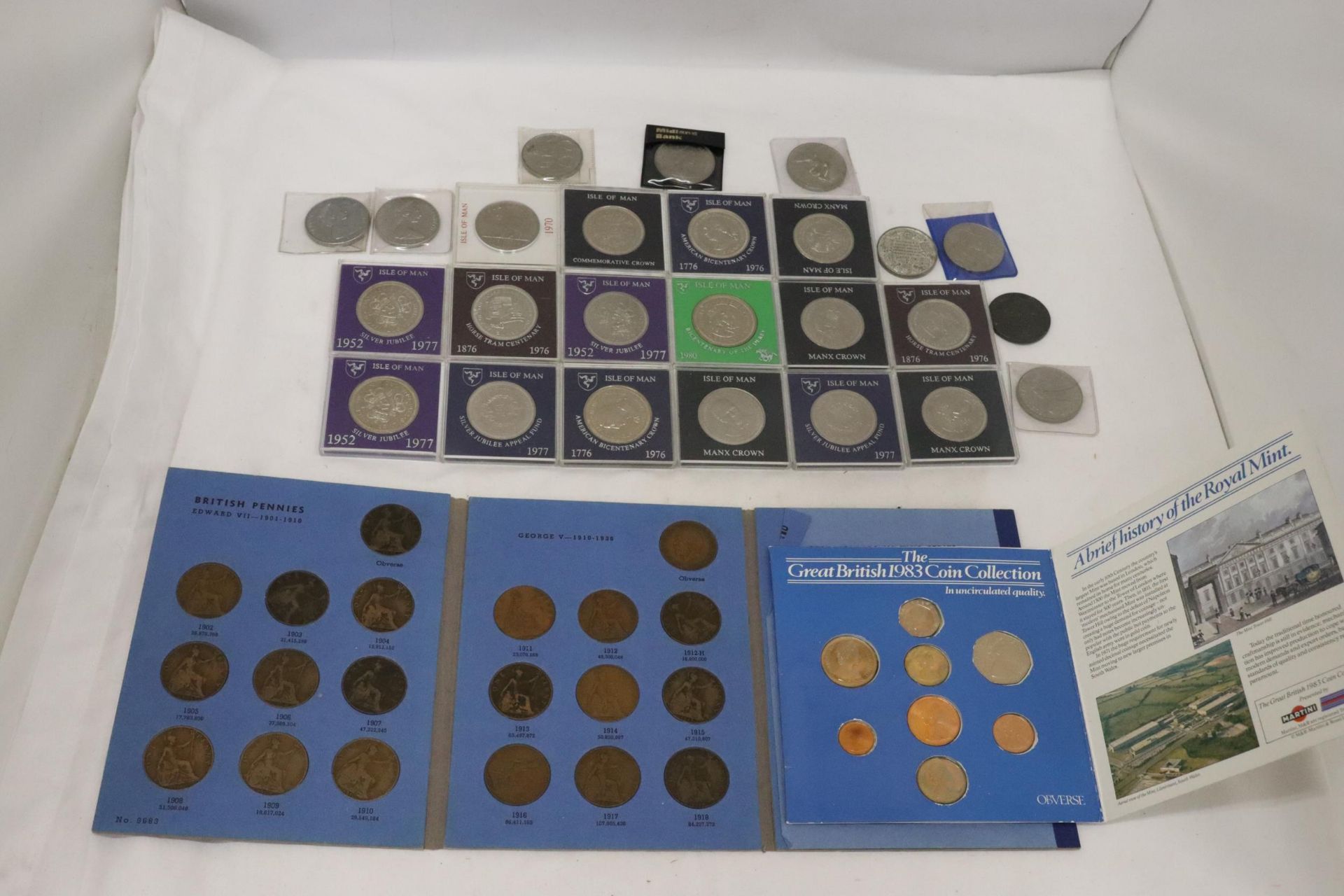 TWENTY FIVE COMMEMORATIVE CROWNS, THE GREAT BRITISH 1983 COIN COLLECTION AND GREAT BRITAIN PENNIES