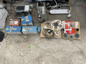 AN ASSORTMENT OF PROJECTOR ITEMS TO INCLUDE PROJECTORS, STORAGE BOXES AND REELS ETC