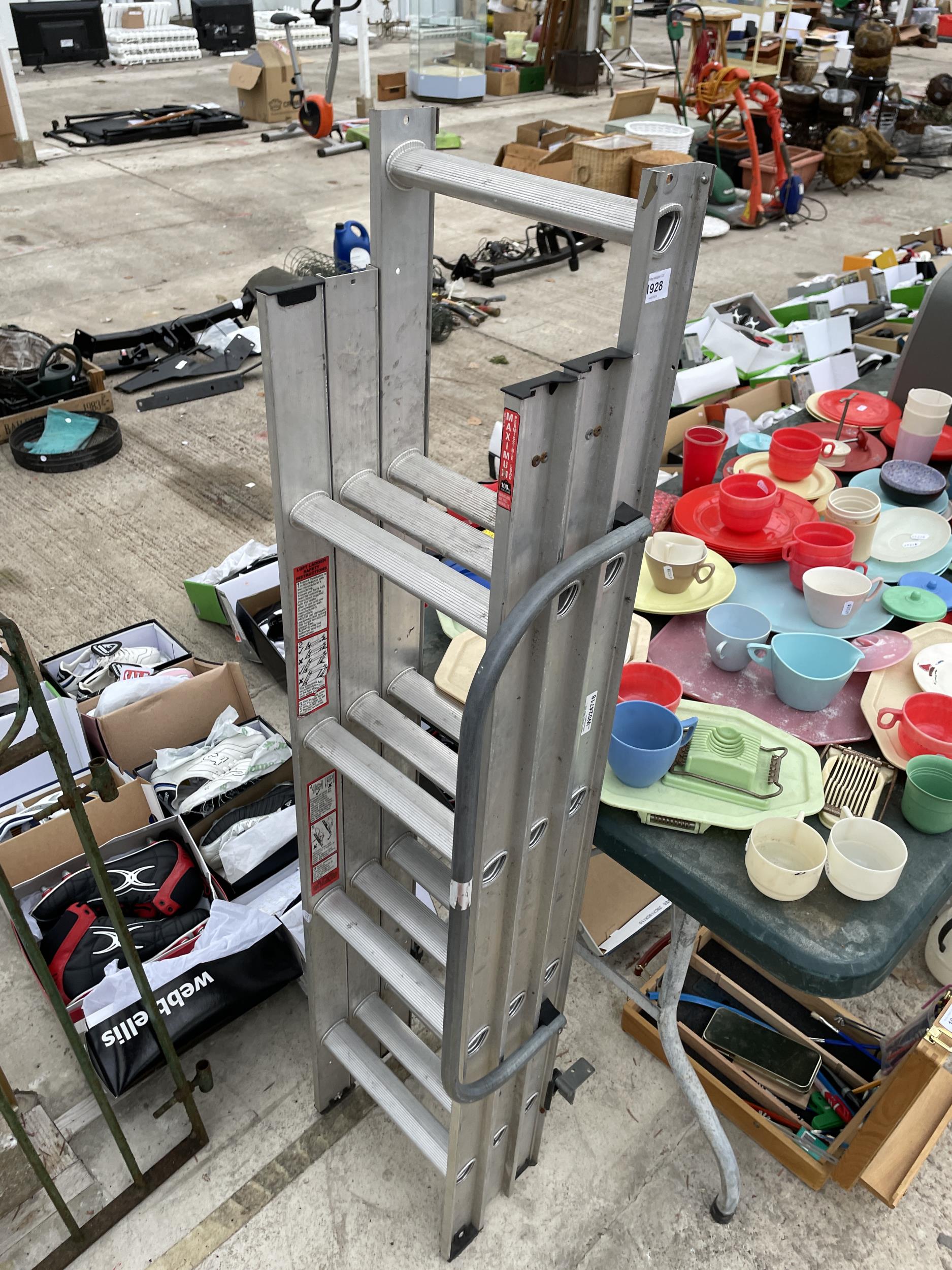 AN ALUMINIUM THREE SECTION LOFT LADDER