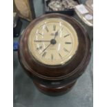 A BOWLING BALL CLOCK ON A WOODEN STAND, HEIGHT 13CM