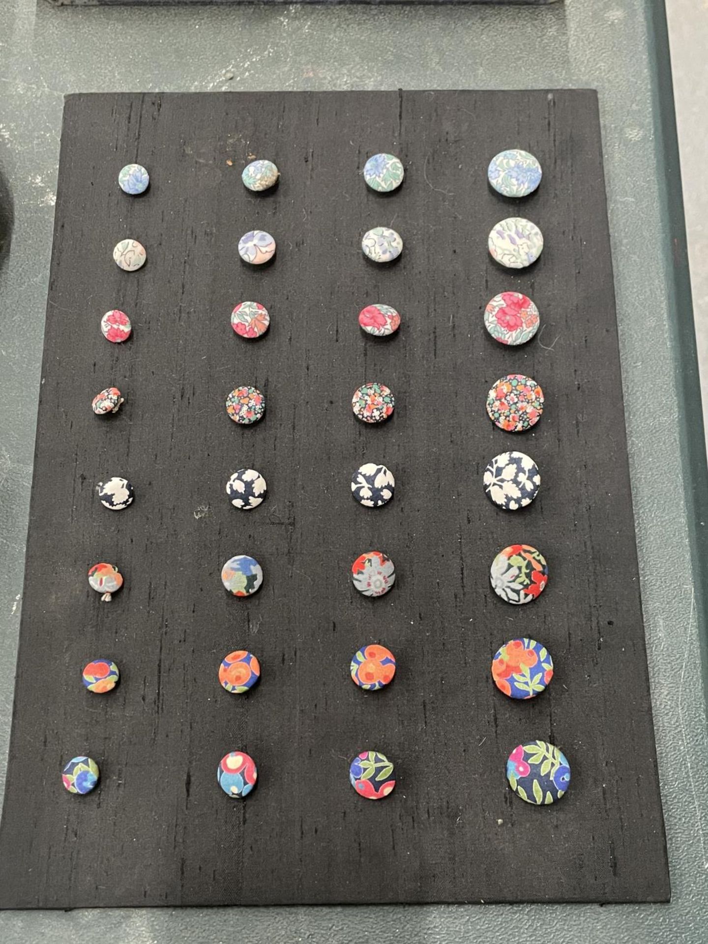 A DISPLAY OF VINTAGE 'TANA LAWN' LIBERTY BUTTONS