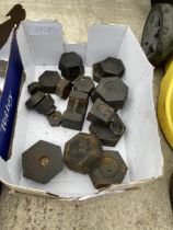 AN ASSORTMENT OF VINTAGE CAST IRON WEIGHTS