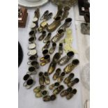 A LARGE QUANTITY OF BRASS, WHITE METAL AND PEWTER BOOTS