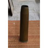 A LARGE MID TWENTIETH CENTURY BRASS SHELL CASE - 64 CM