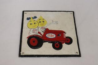 A CAST ESSO SIGN, WITH MR AND MRS DRIP IN A CAR, 24CM X 24CM