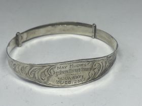 A SILVER BANGLE MAY HUGHES, 17 BRYN HYFRD TERRACE CONWAY