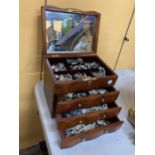 A THREE DRAWER JEWELLERY CHEST WITH HINGED TOP, MIRROR AND COSTUME JEWELLERY CONTENTS