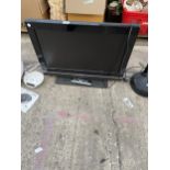 A LOGIX 20" TELEVISION WITH REMOTE CONTROL