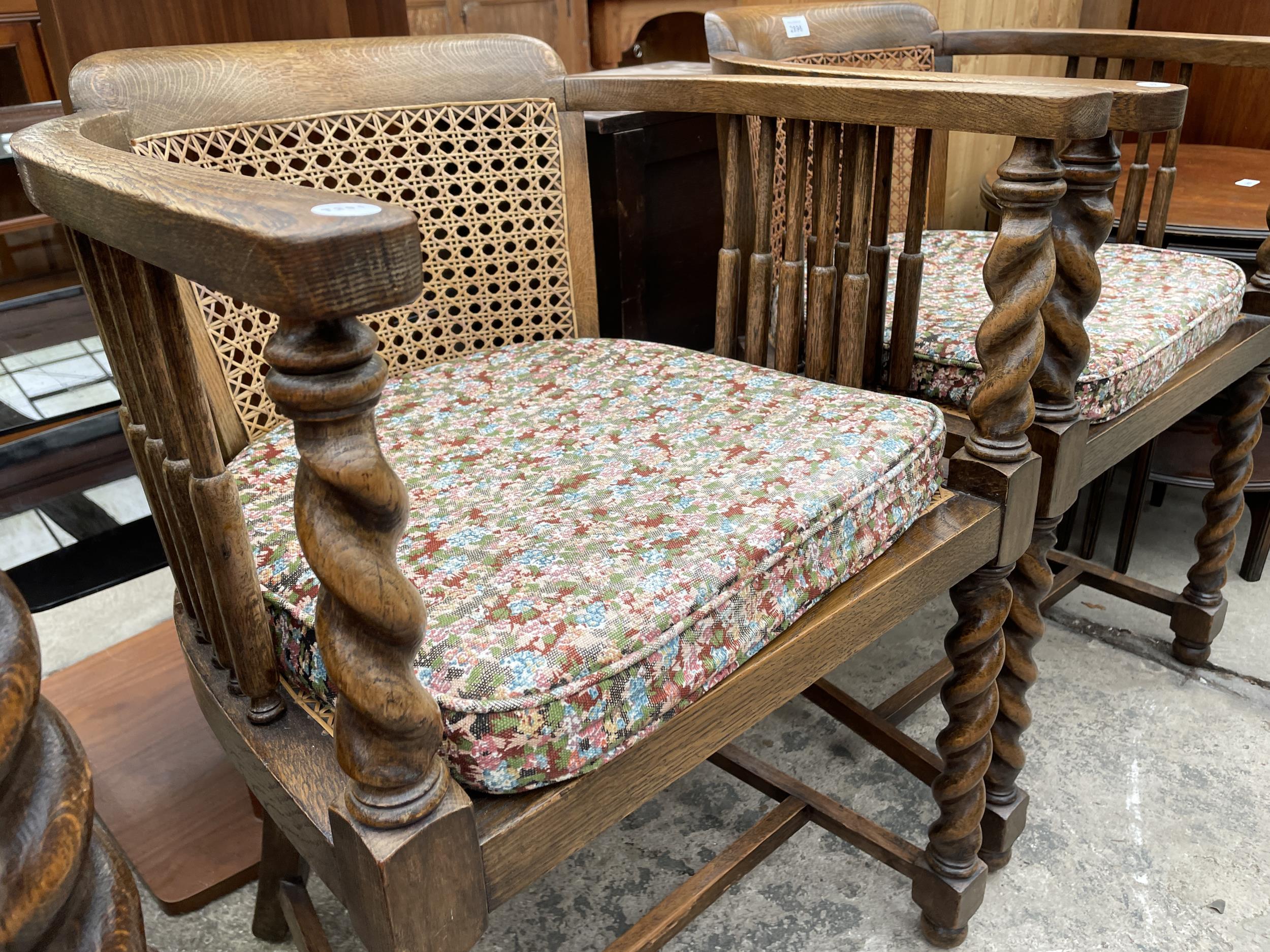 A PAIR OF EARLY 20TH CENTURY OAK TUB CHAIRS WITH CANE SEATS AND BACKS ON BARLEY TWIST LEGS AND - Image 3 of 4