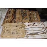 A QUANTITY OF COSTUME JEWELLERY NECKLACES