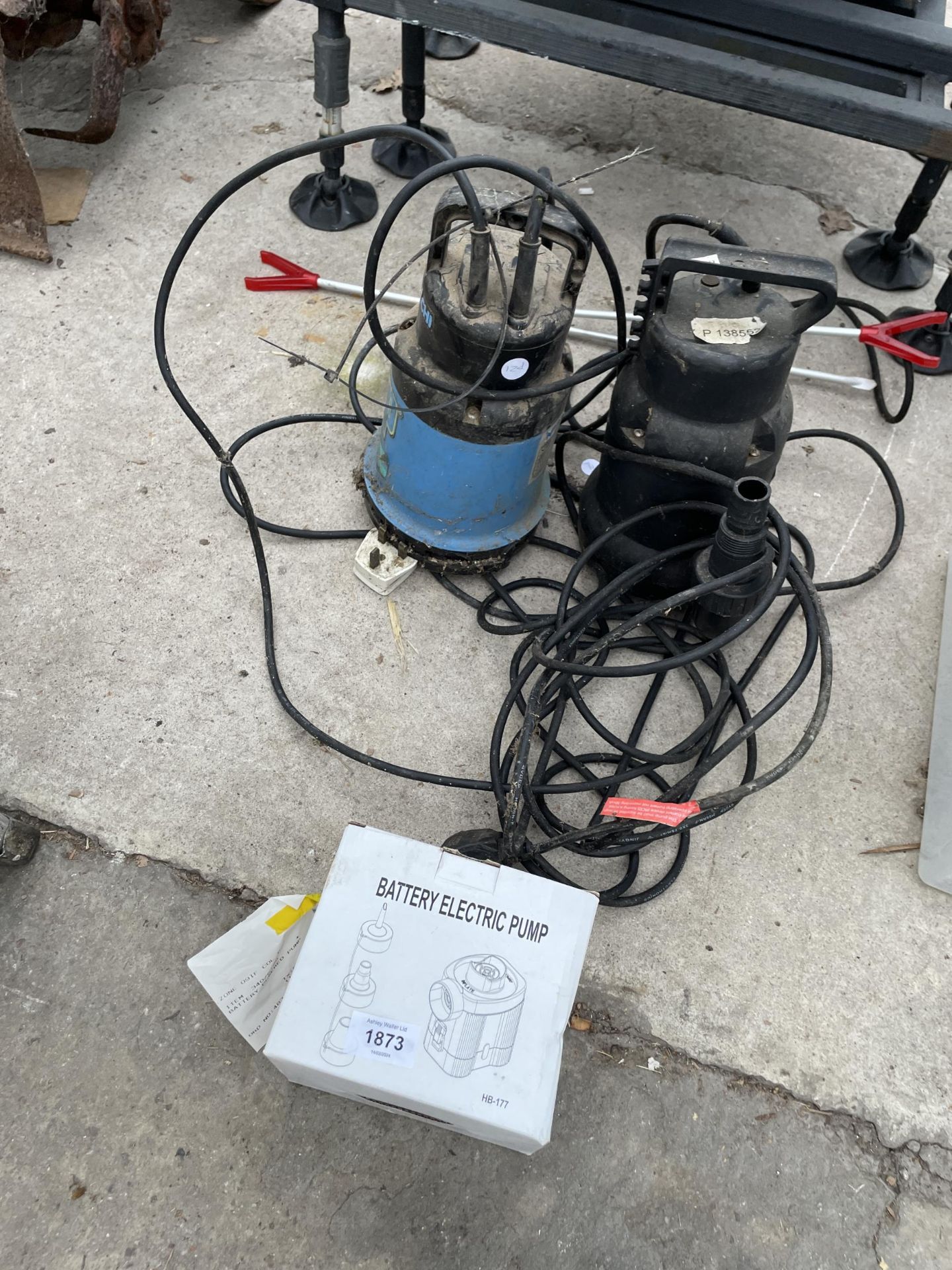 TWO SUBMERSIBLE PUMPS AND AN ELECTRIC BATTERY PUMP