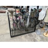 A PAIR OF WROUGHT IRON GARDEN GATES (EACH GATE W:138CM)