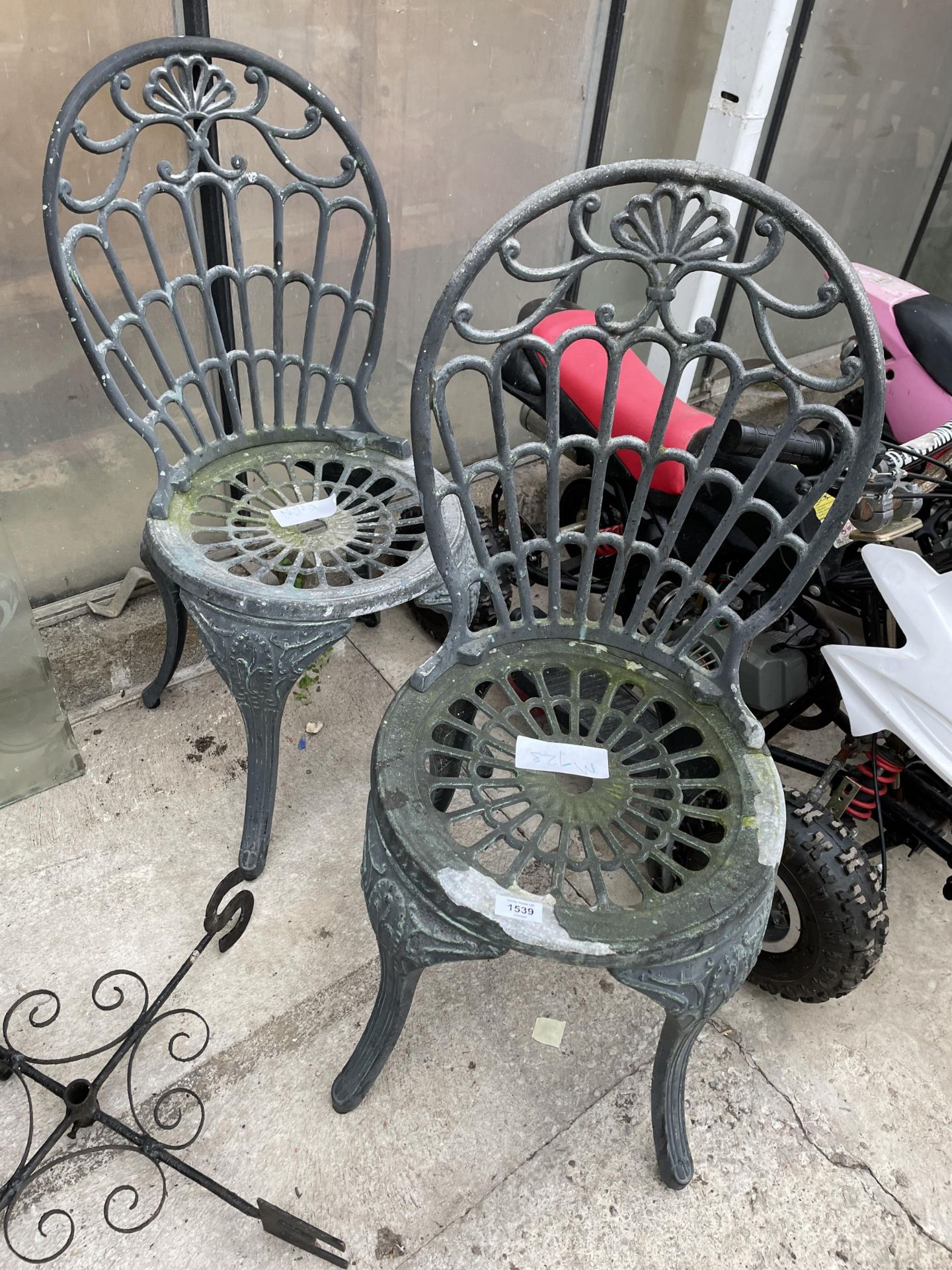 A PAIR OF CAST ALLOY BISTRO CHAIRS