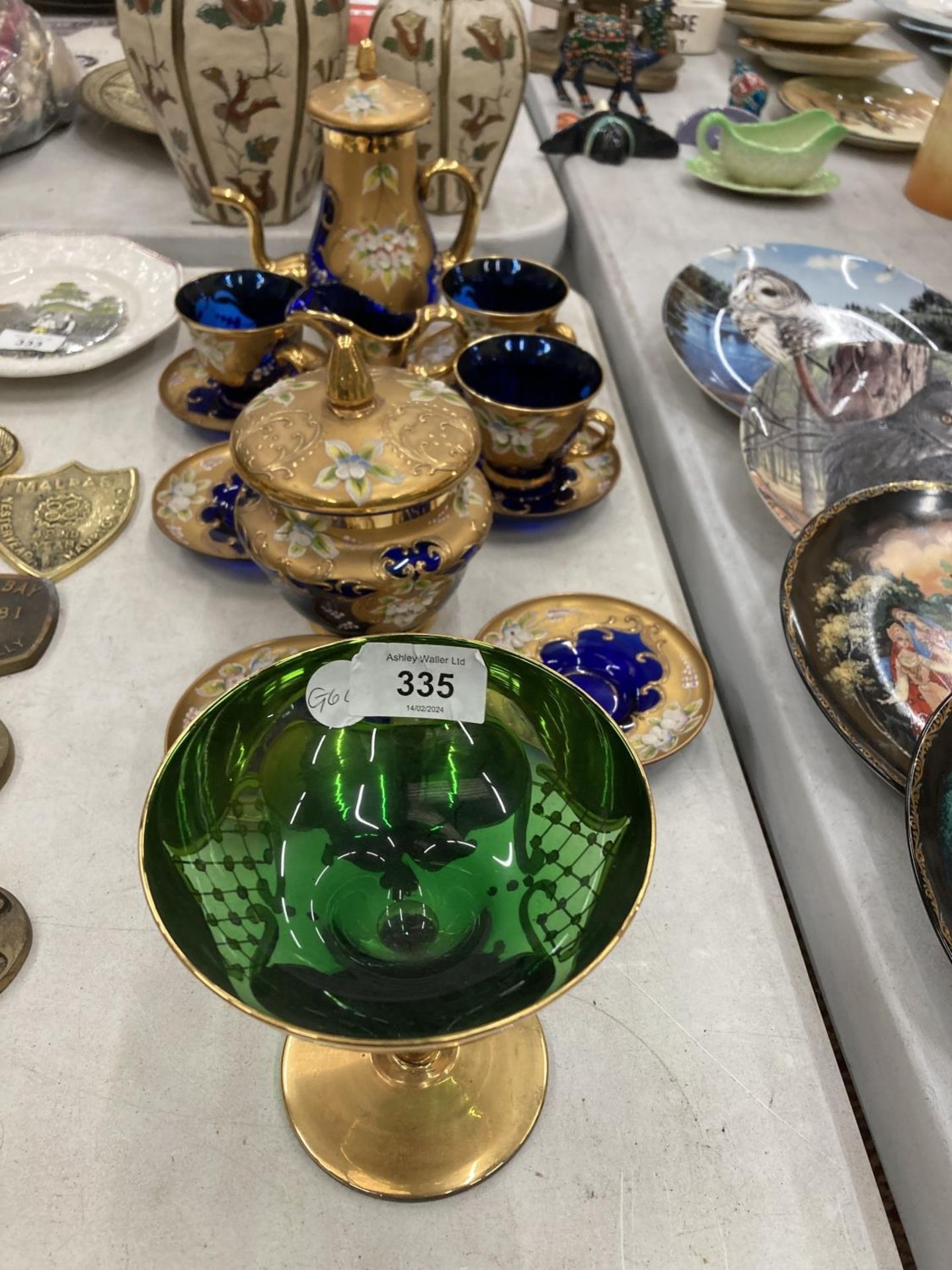 A COLLECTION OF BOHEMIAN BLUE GLASSWARE WITH GILT AND FLORAL PATTERN TO INCLUDE A SMALL COFFEE