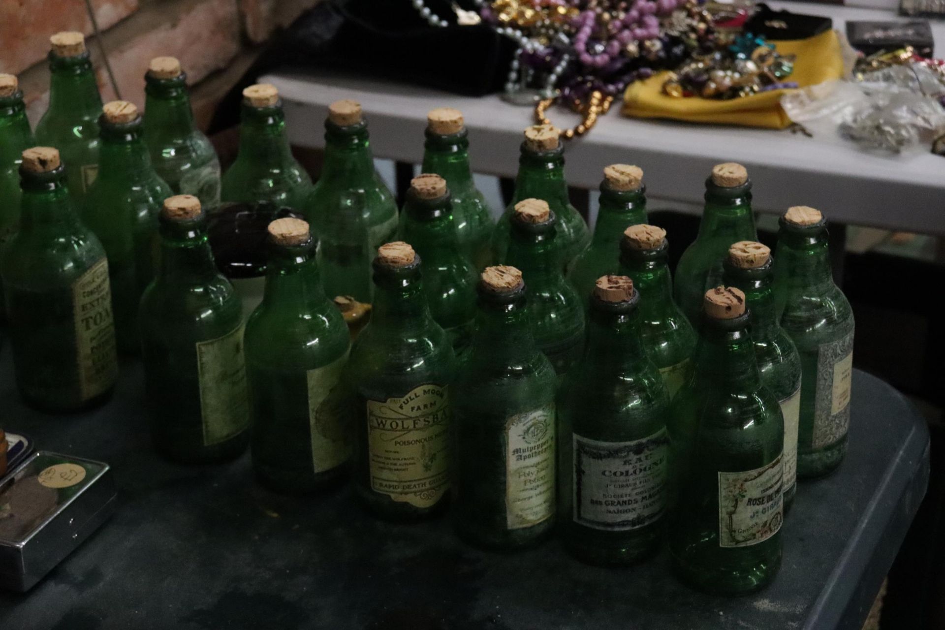 A LARGE COLLECTION OF VINTAGE GREEN BOTTLES WITH CORKS TO INCLUDE EXTRACT OF TOAD, SLUG REPELLENT, - Image 2 of 7