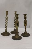 TWO PAIRS OF BRASS CANDLESTICKS, HEIGHTS 27CM AND 30CM