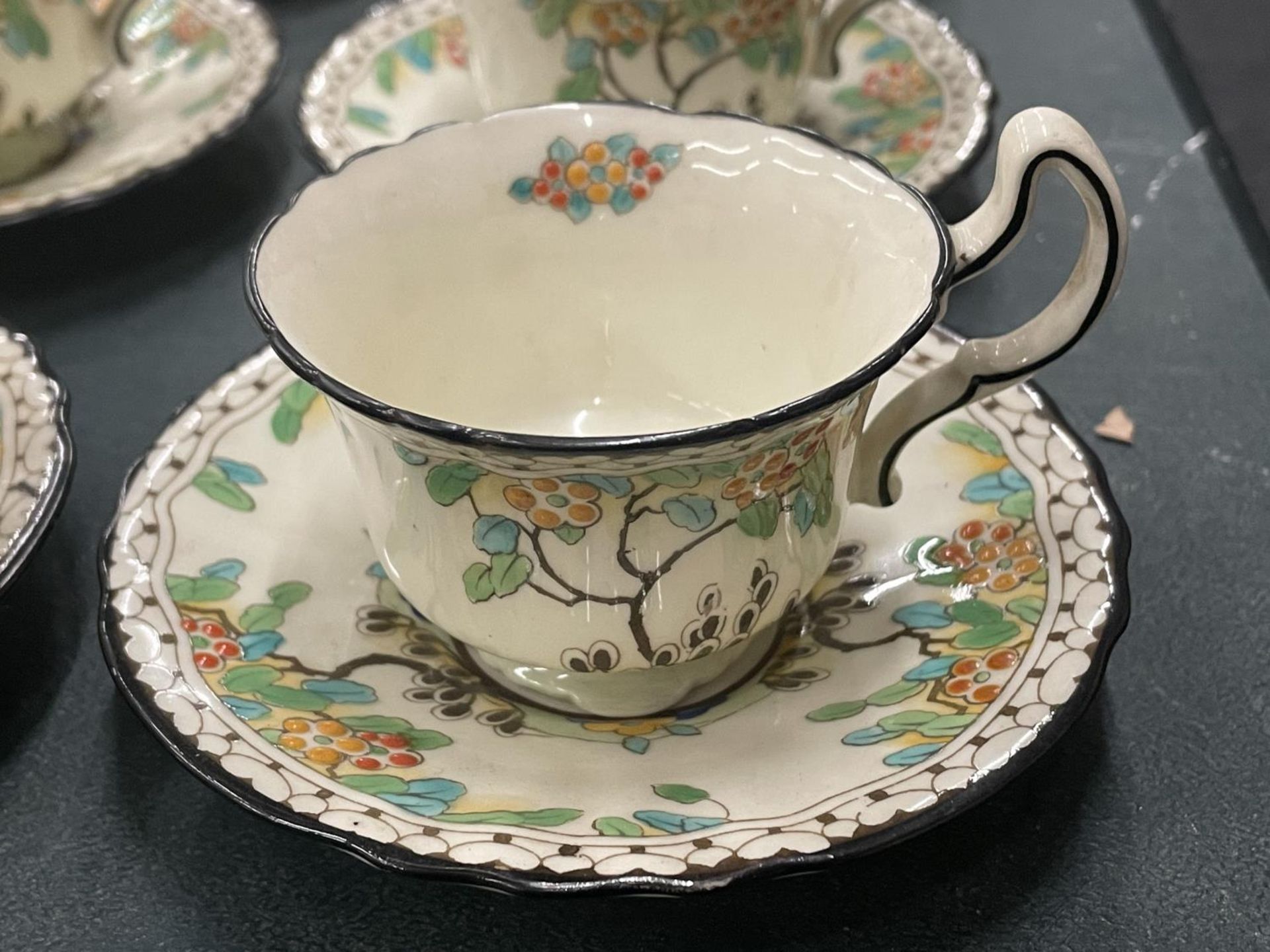 A VINTAGE SET OF SIX ROYAL DOULTON CUPS AND SAUCERS, REG NO. 702852 - Image 2 of 4