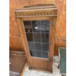 A MID 20TH CENTURY OAK GLAZED, LEADED AND LINCHFOLD DISPLAY CABINET