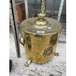 A VINTAGE BRASS THREE FOOTED COAL BUCKET WITH LID