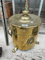 A VINTAGE BRASS THREE FOOTED COAL BUCKET WITH LID