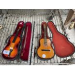 TWO MINIATURE CASED MUSICAL INSTRUMENTS TO INCLUDE A VIOLIN WITH BOW AND A GUITAR