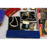 A QUANTITY OF COSTUME JEWELLERY TO INCLUDE NECKLACES, CUFFLINKS, WATCHES, BRACELETS, A PEN SET, ETC