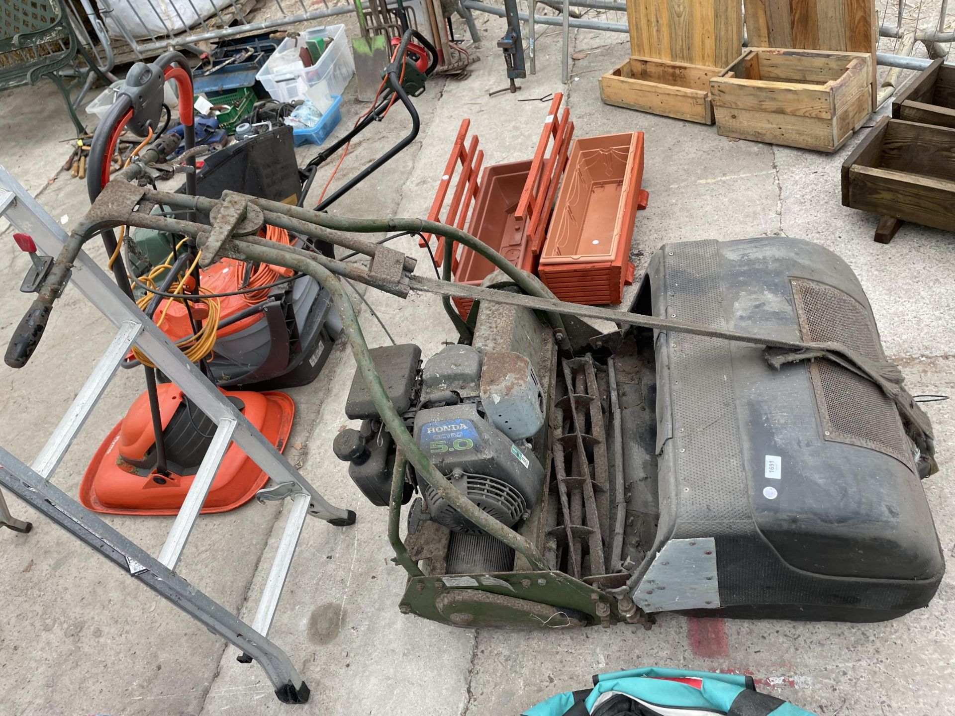 A LARGE VINTAGE CYLINDER MOWER COMPLETE WITH HONDA ENGINE AND GRASS BOX - Image 2 of 3