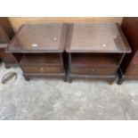 A PAIR OF STAG MINSTREL BEDSIDE TABLES