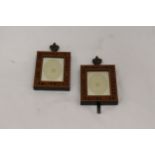 A PAIR OF SMALL INLAID WOODEN PHOTO FRAMES, 7CM X 8CM