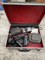 AN ASSORTMENT OF VINTAGE PHOTOGRAPHY EQUIPMENT TO INCLUDE A ZENIT CAMERA, KODAK CAMERA, LENS AND A