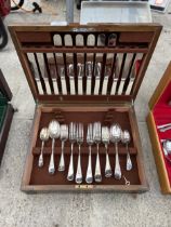 A BELIEVED COMPLETE OAK CASED CANTEEN OF CUTLERY