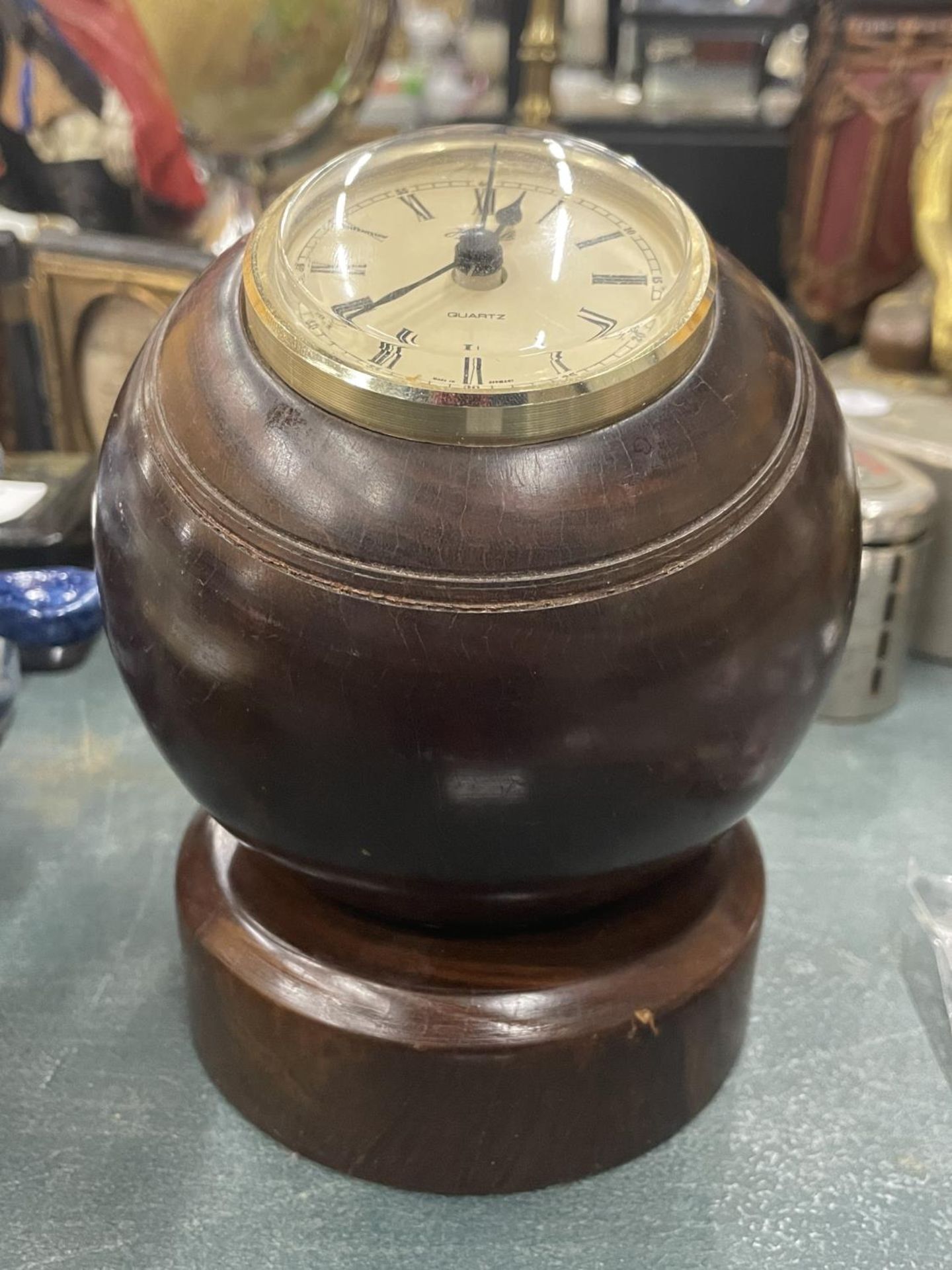 A BOWLING BALL CLOCK ON A WOODEN STAND, HEIGHT 13CM - Image 2 of 2
