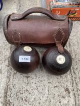 TWO SETS OF CROWN GREEN BOWLING WOODS TO INCLUDE ONE SET WITH A CARRY BAG